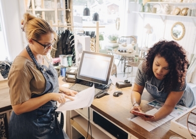 Two women working at their small business